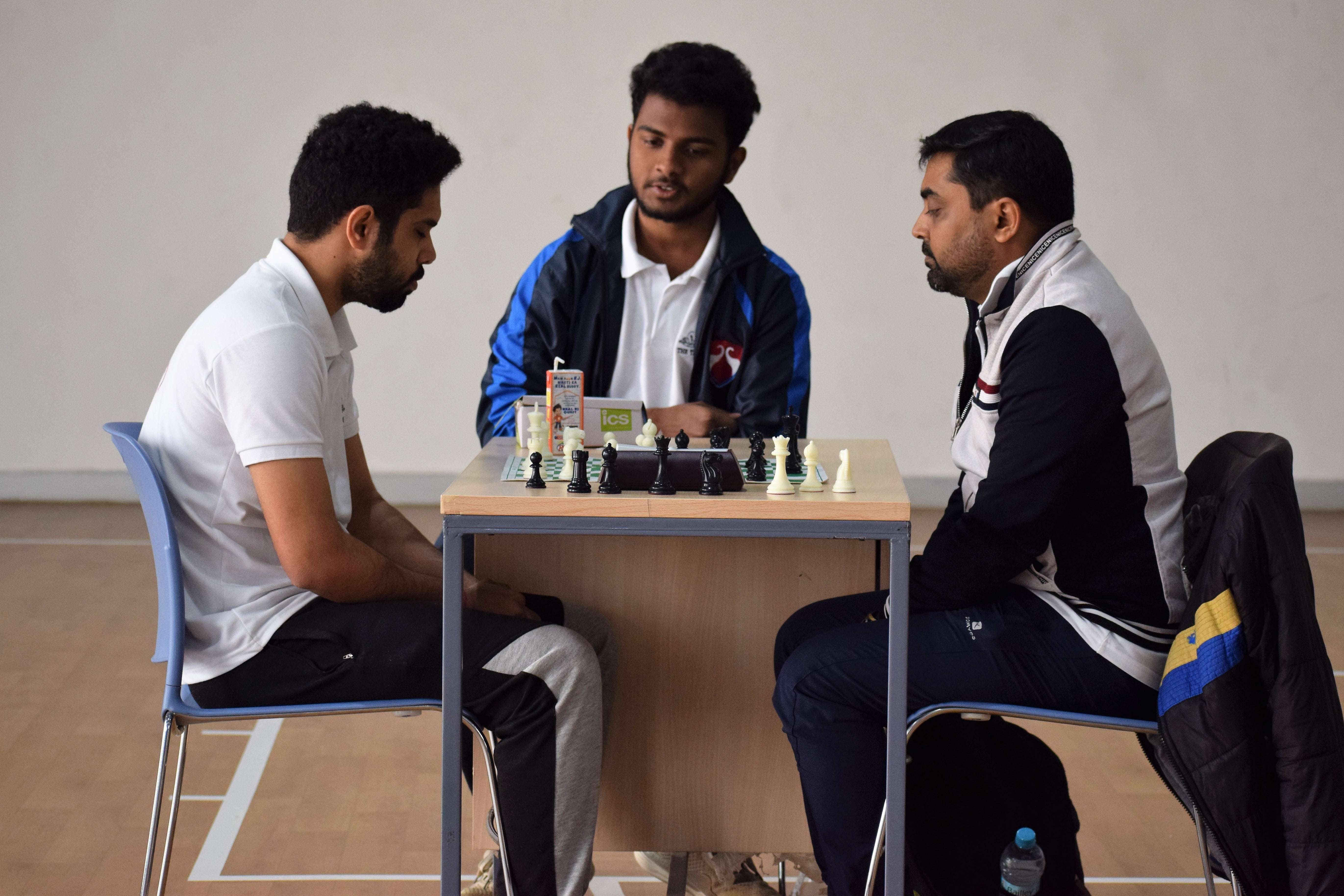 The final round of the chess tournament was intensely contested between Aman Dalal (TIL) and Yashpal Sharma (BCCL). The umpire in the middle looks on