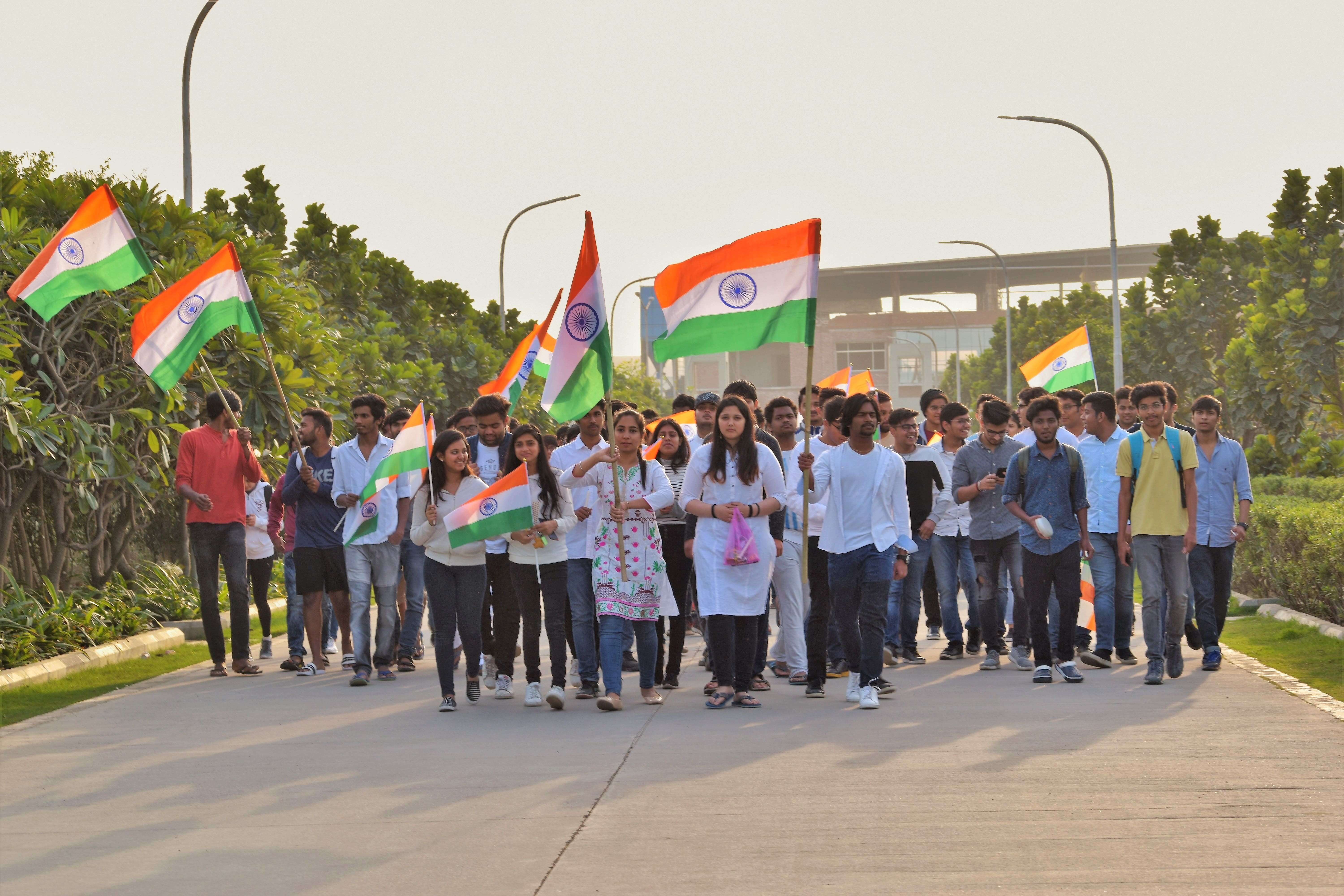 The candle march begins, led by Poorva Singh Rathore, Deena Dayal and Japna Batra.